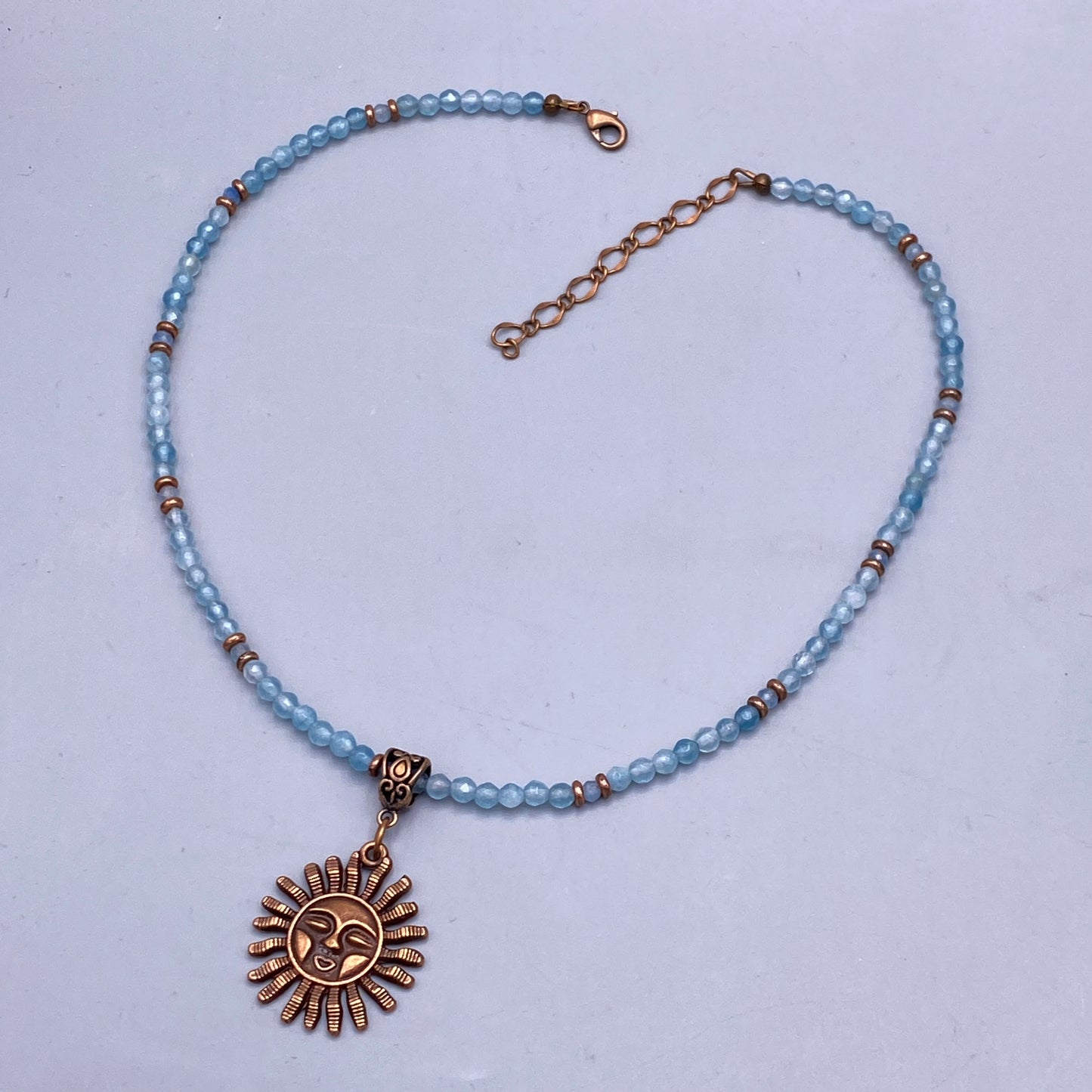 Aquamarine gemstone beaded necklace with Sun pendant