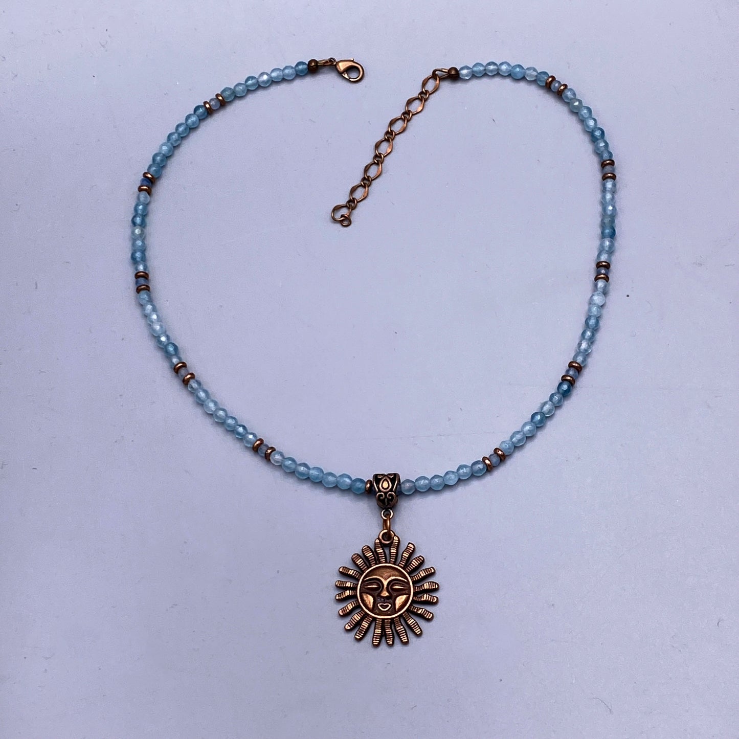 Aquamarine gemstone beaded necklace with Sun pendant