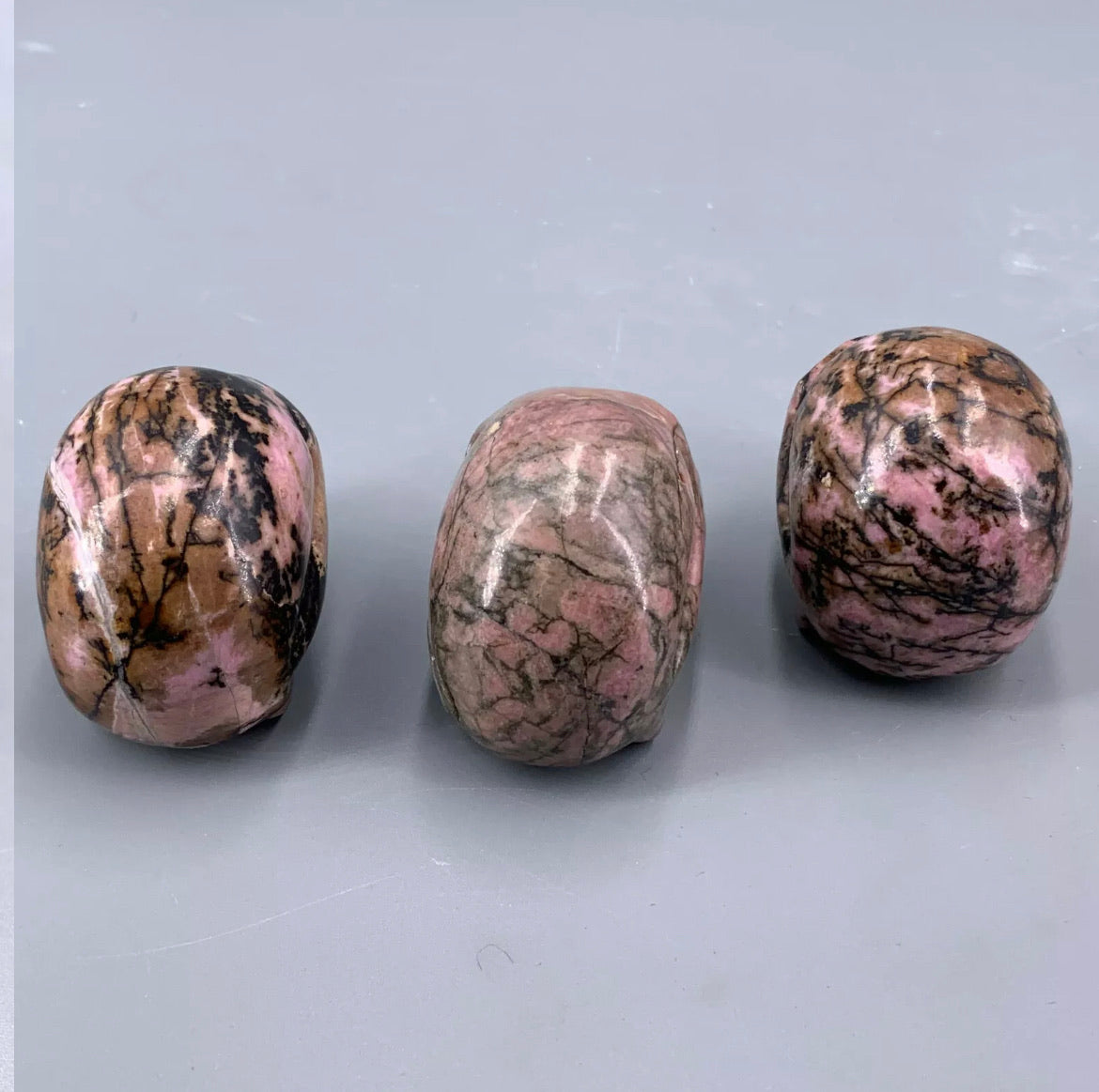 Natural Rhodonite gemstone Skull