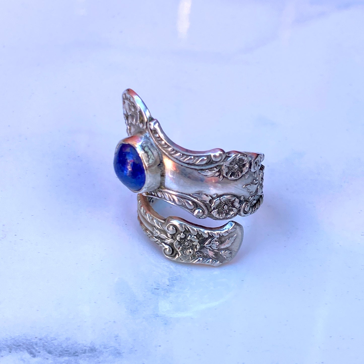 Vintage Sterling Silver Spoon Ring with Tanzanite gemstones.