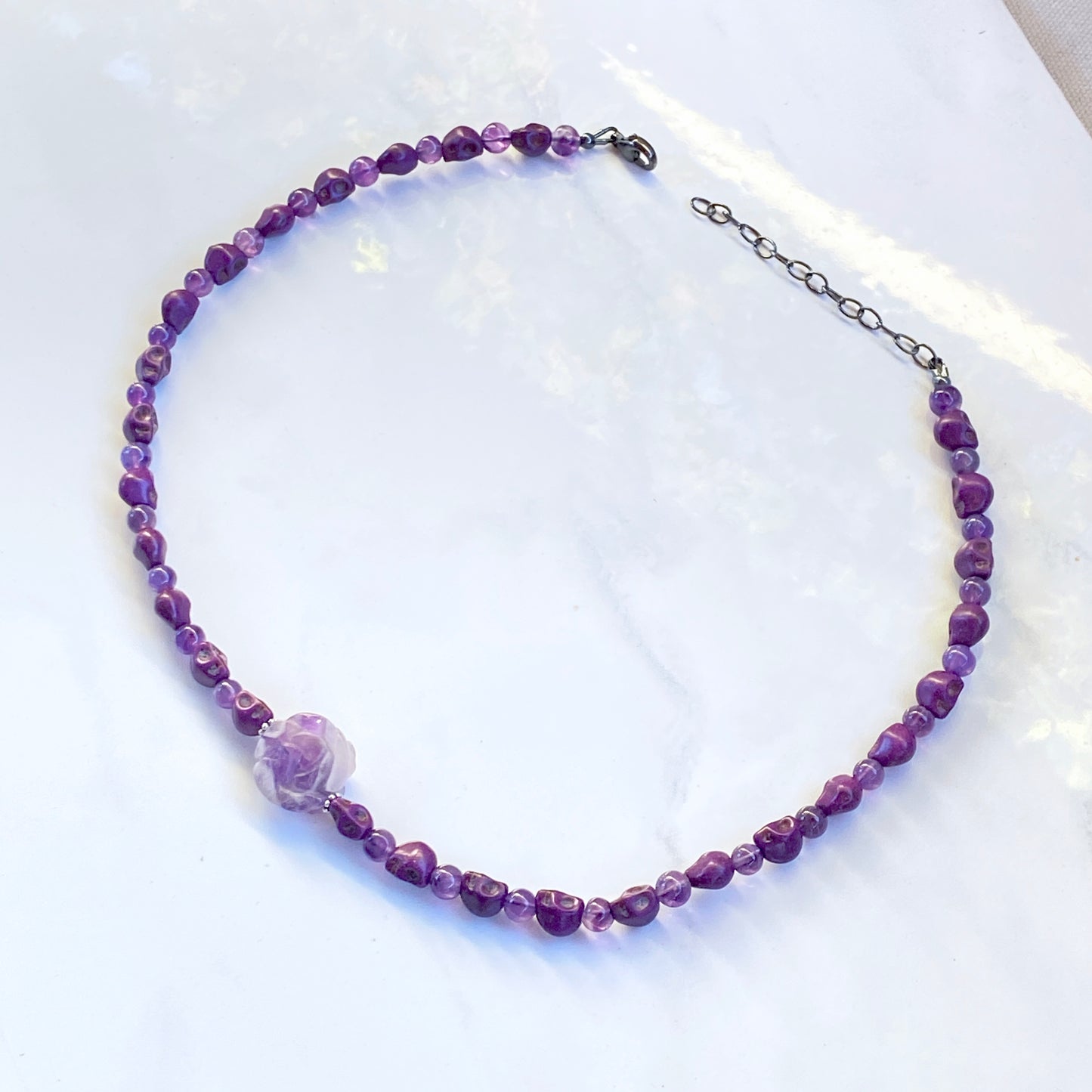 Amethyst gemstone and Howlite Skull Necklace