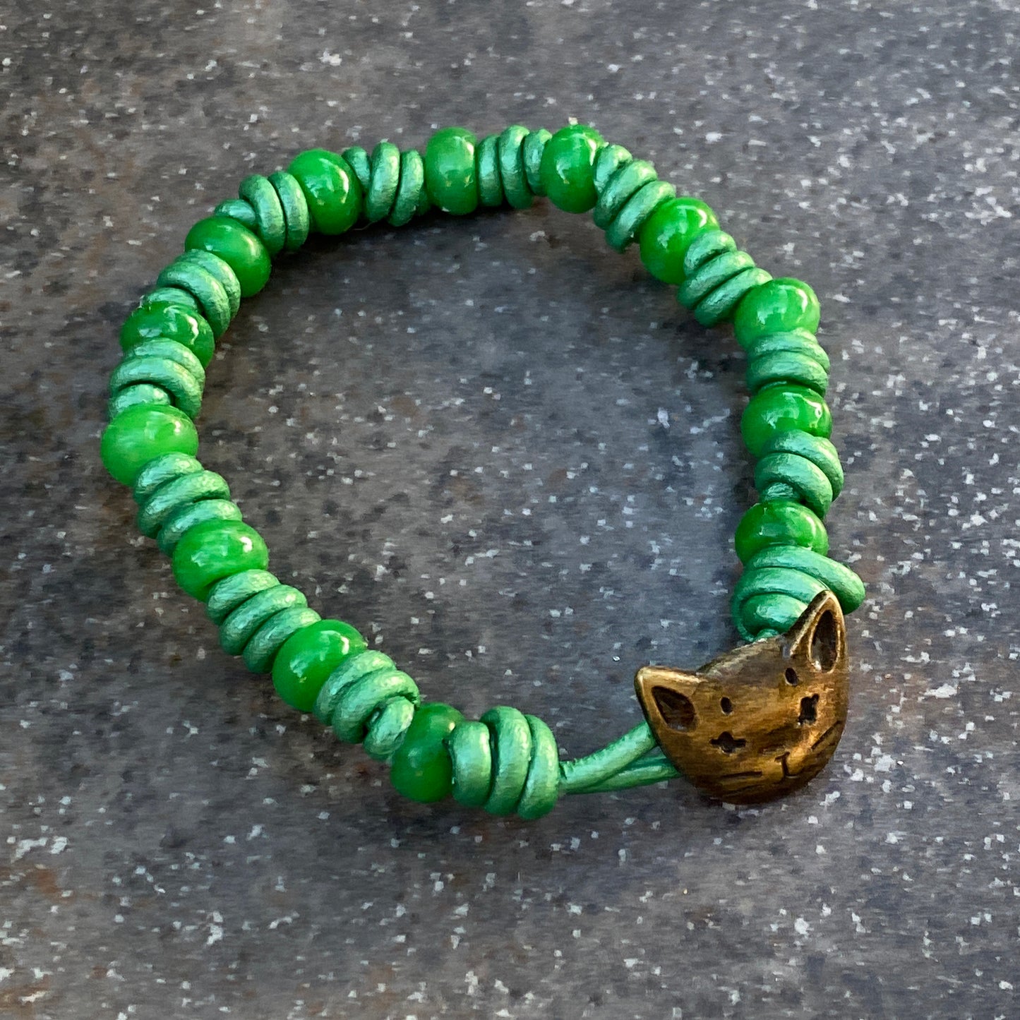 Hand knotted Jade gemstone on green Leather Bracelet