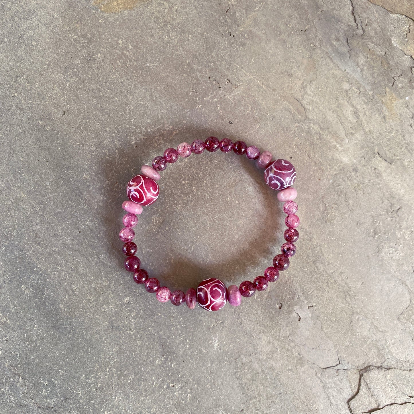 Red Jade, pink tourmaline, and strawberry Lepidocrocite gemstone stretch bracelet