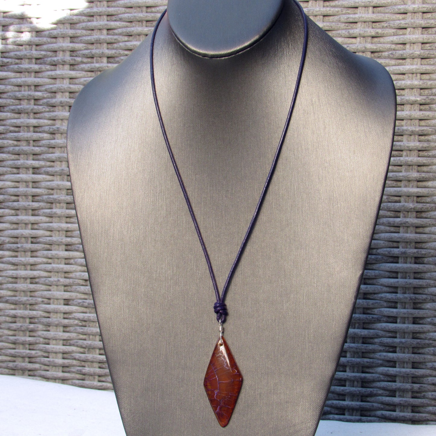 Dragon’s Vein Agate gemstone, Sterling Silver, and Leather