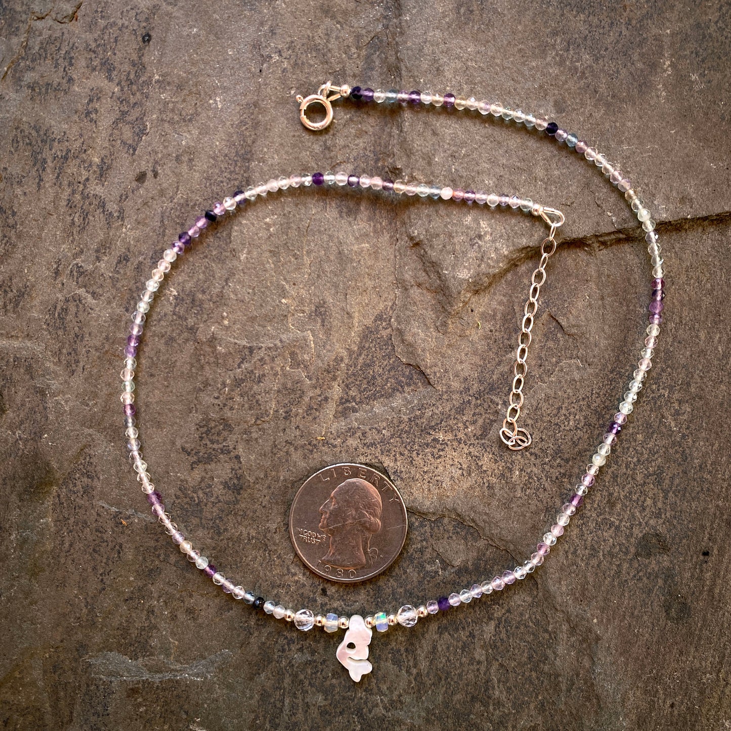 Mother of pearl mermaid on rainbow fluorite with Ethiopian opals, white topaz and sterling silver.