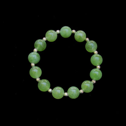 Genuine Peridot gemstone stretch Bracelet with 14kt golf fill