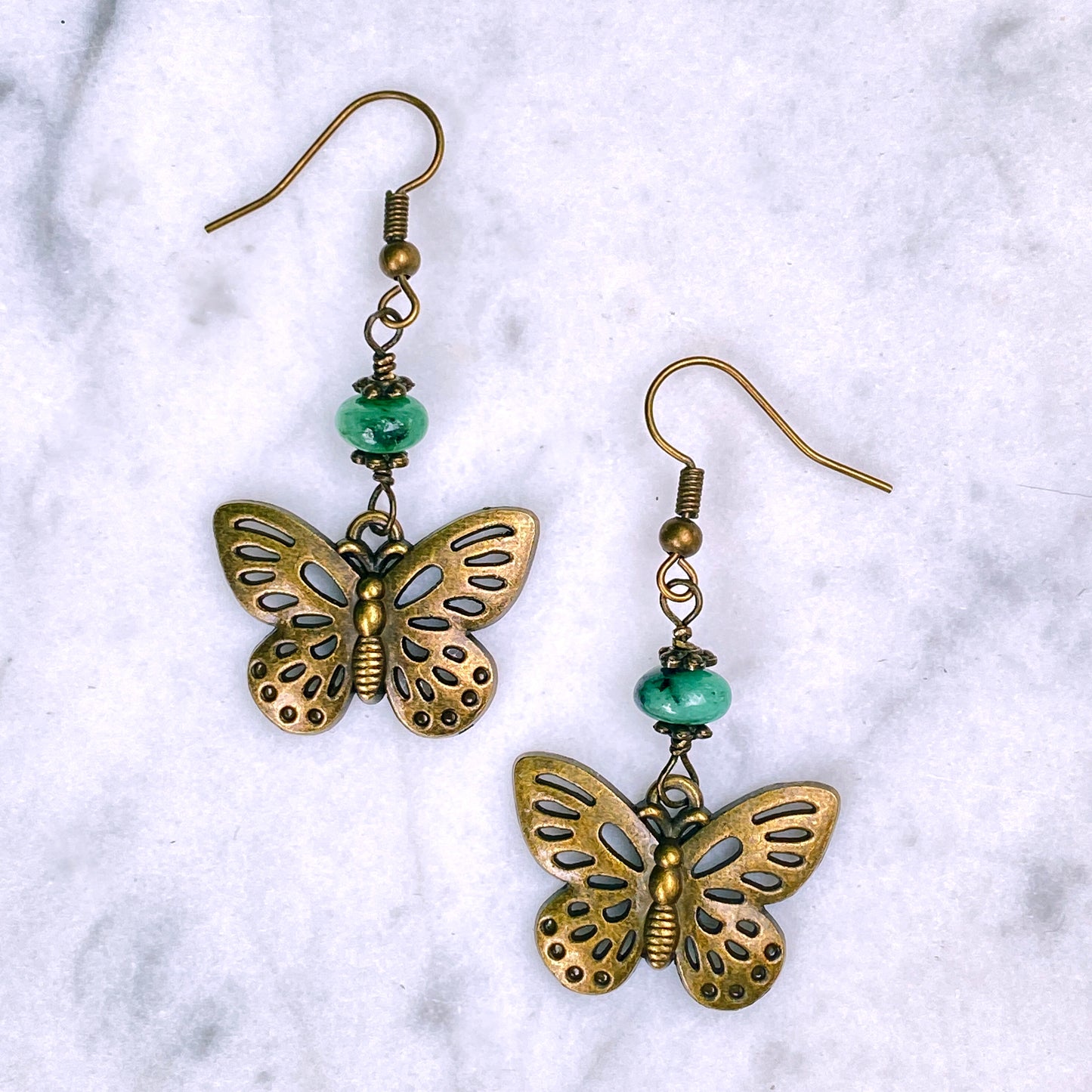 Emerald and Brass Butterfly Dangle Earrings