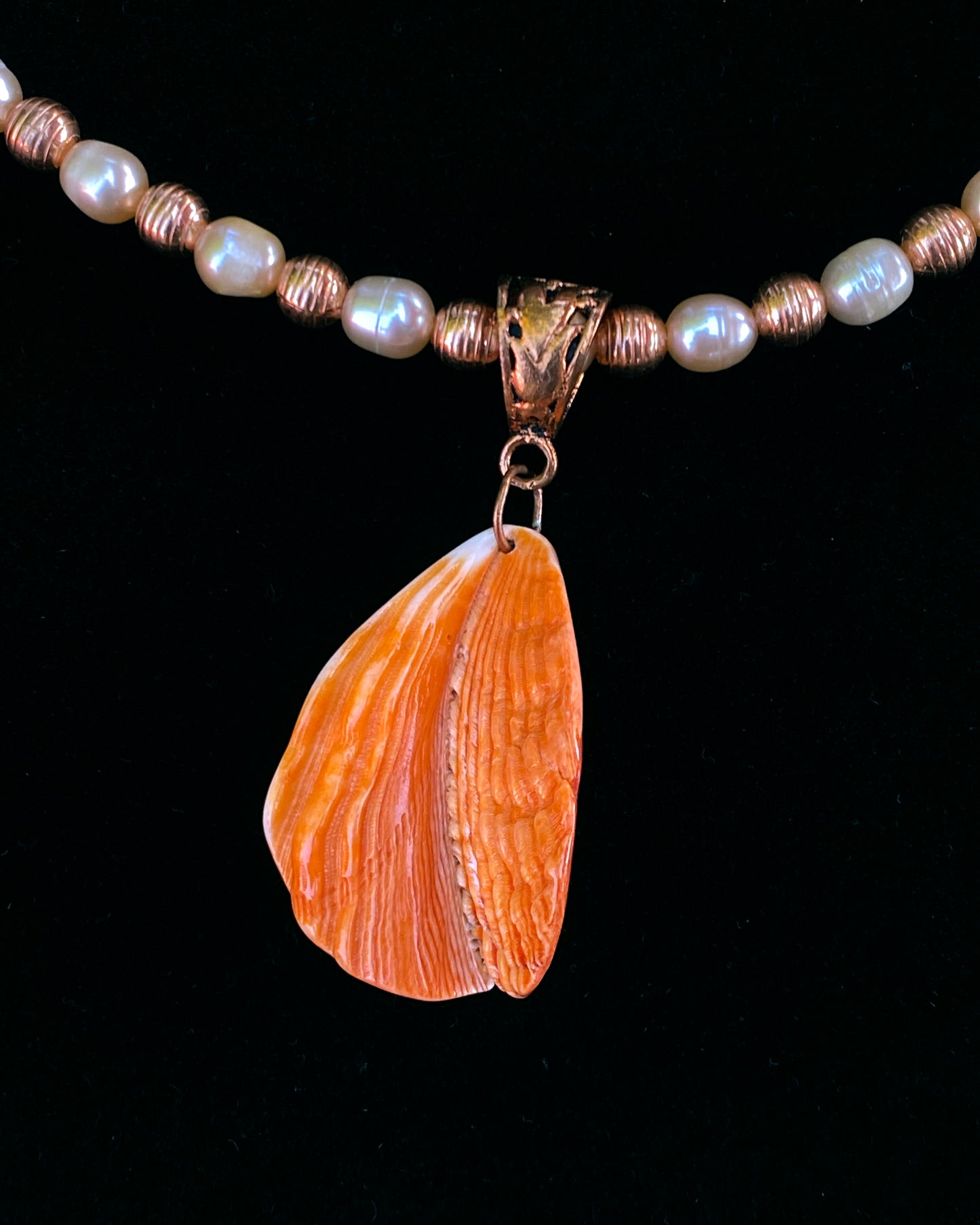 Shell Pendant on Pearl Necklace