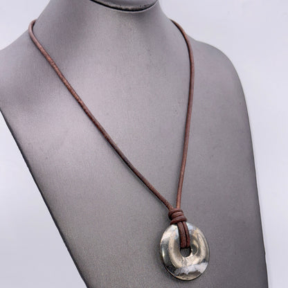 Pyrite donut necklace on leather