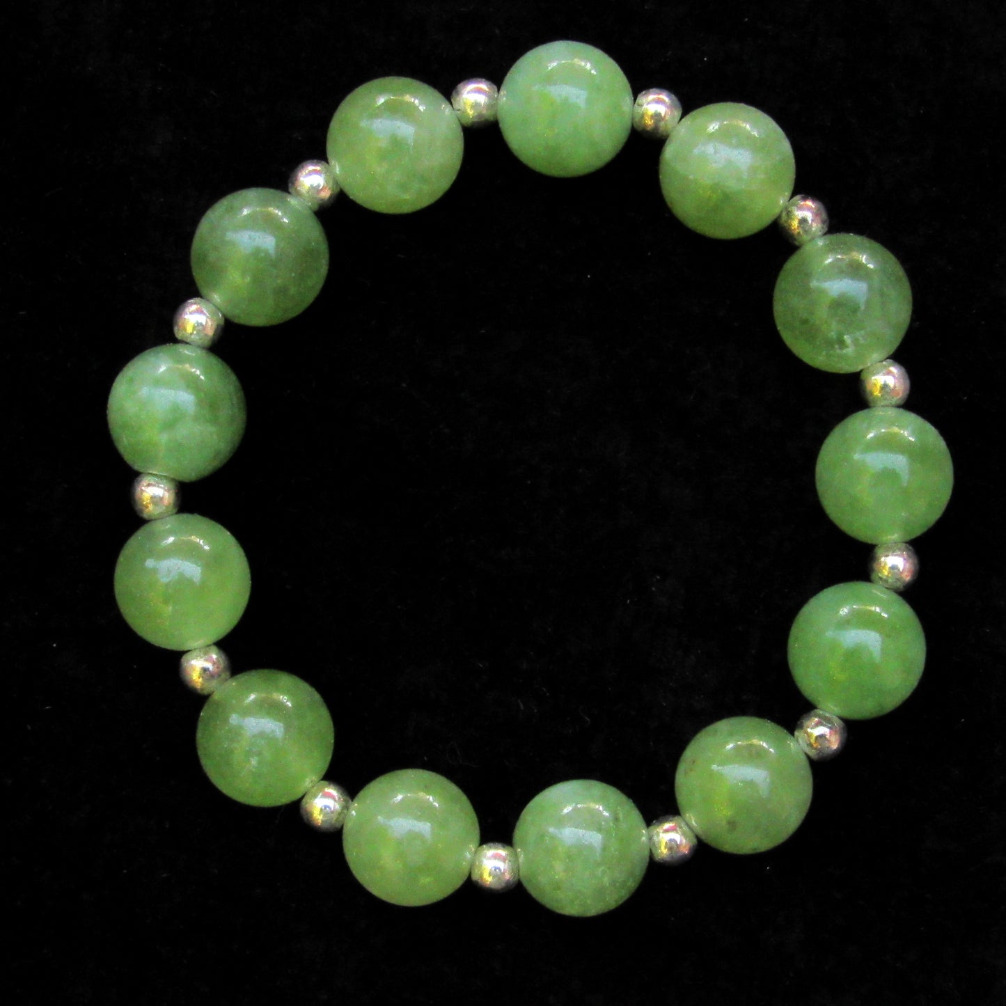 Genuine Peridot gemstone stretch Bracelet with 14kt golf fill