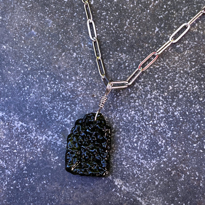 Moldavite Pendant on stainless steel chain necklace.