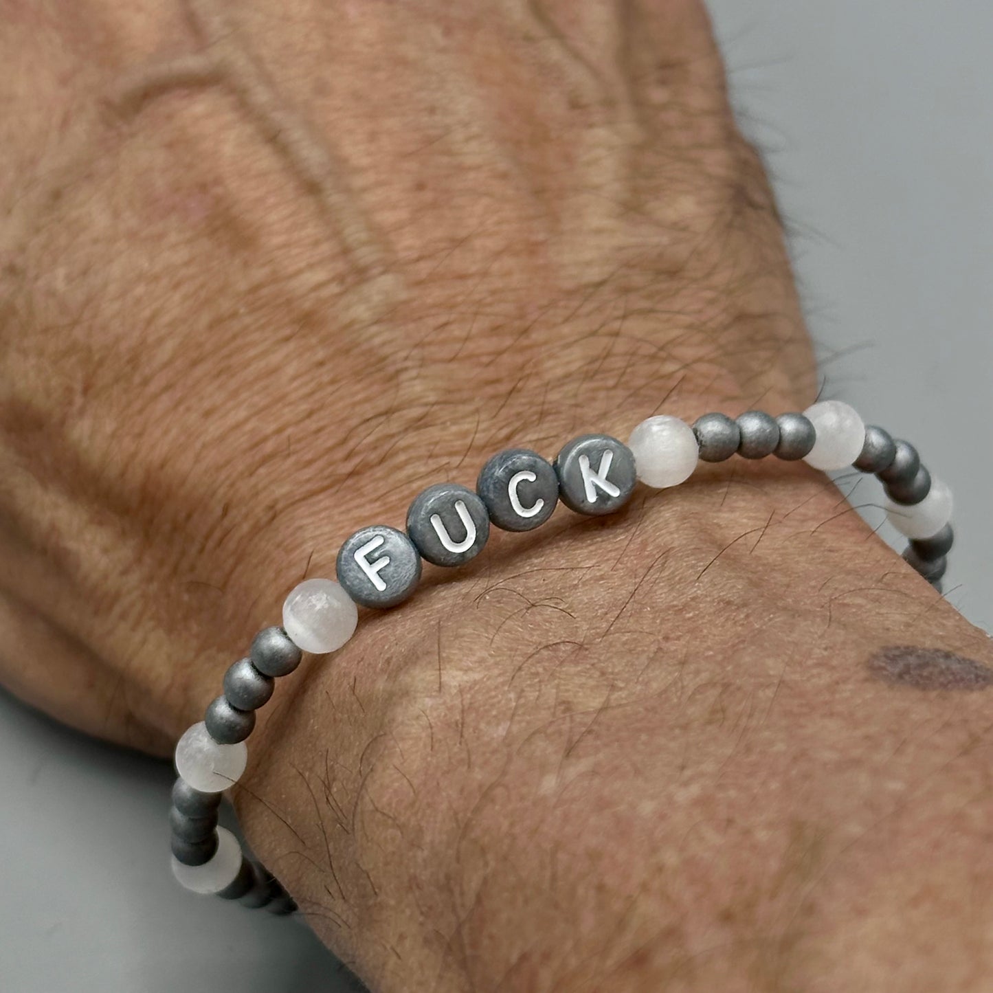 Hematite and Selenite “Fuck” Bracelet