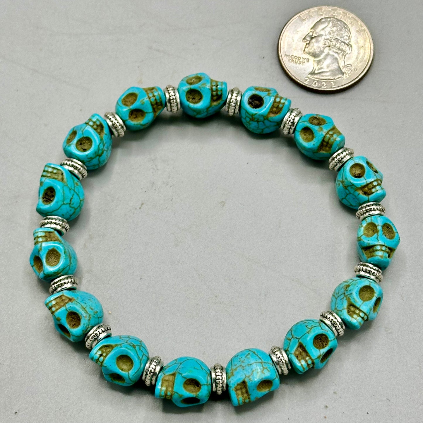 Light Blue Skulls and Brass Bracelet