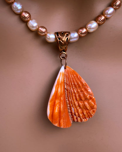 Shell Pendant on Pearl Necklace