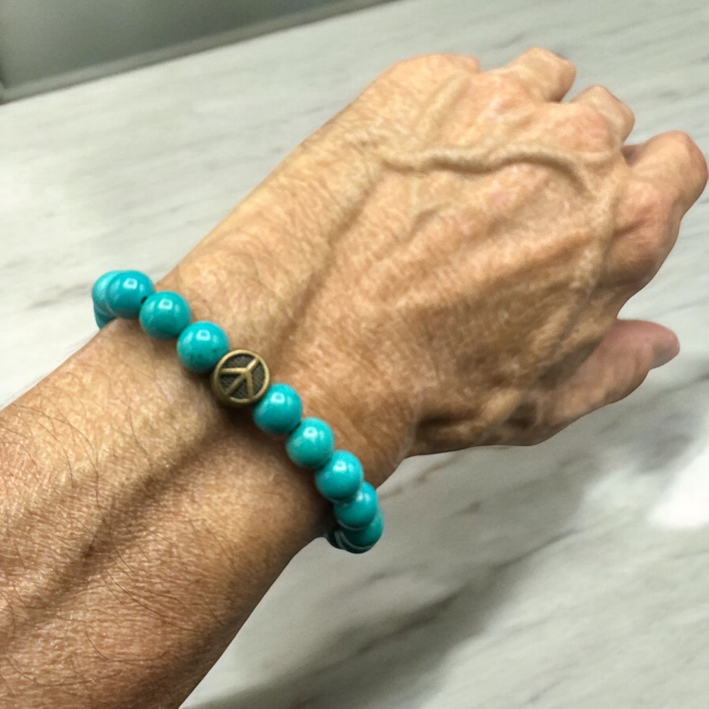 Turquoise gemstone and Peace Sign Bracelet