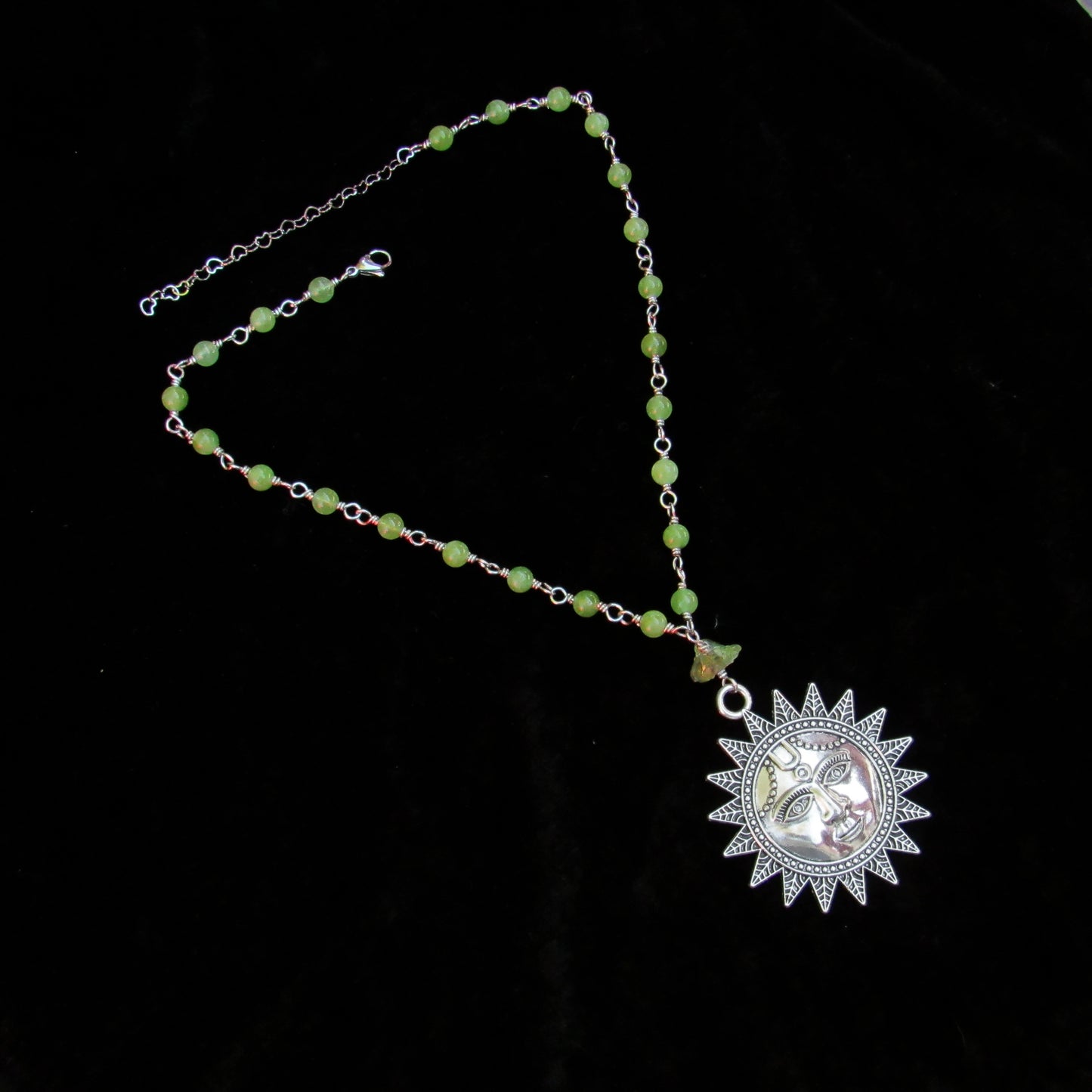 Peridot gemstone beaded necklace with Sun pendant