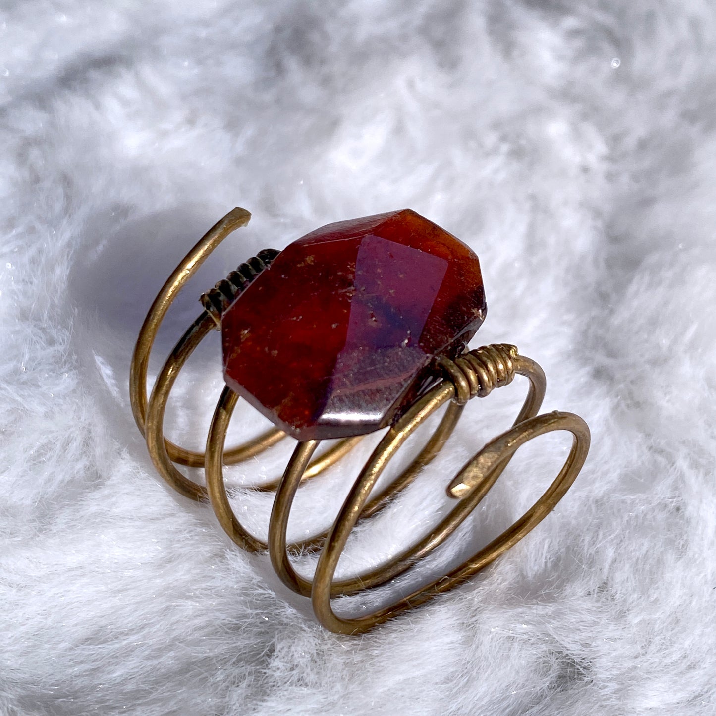 Hand hammered Brass wire ring with garnet birthstone