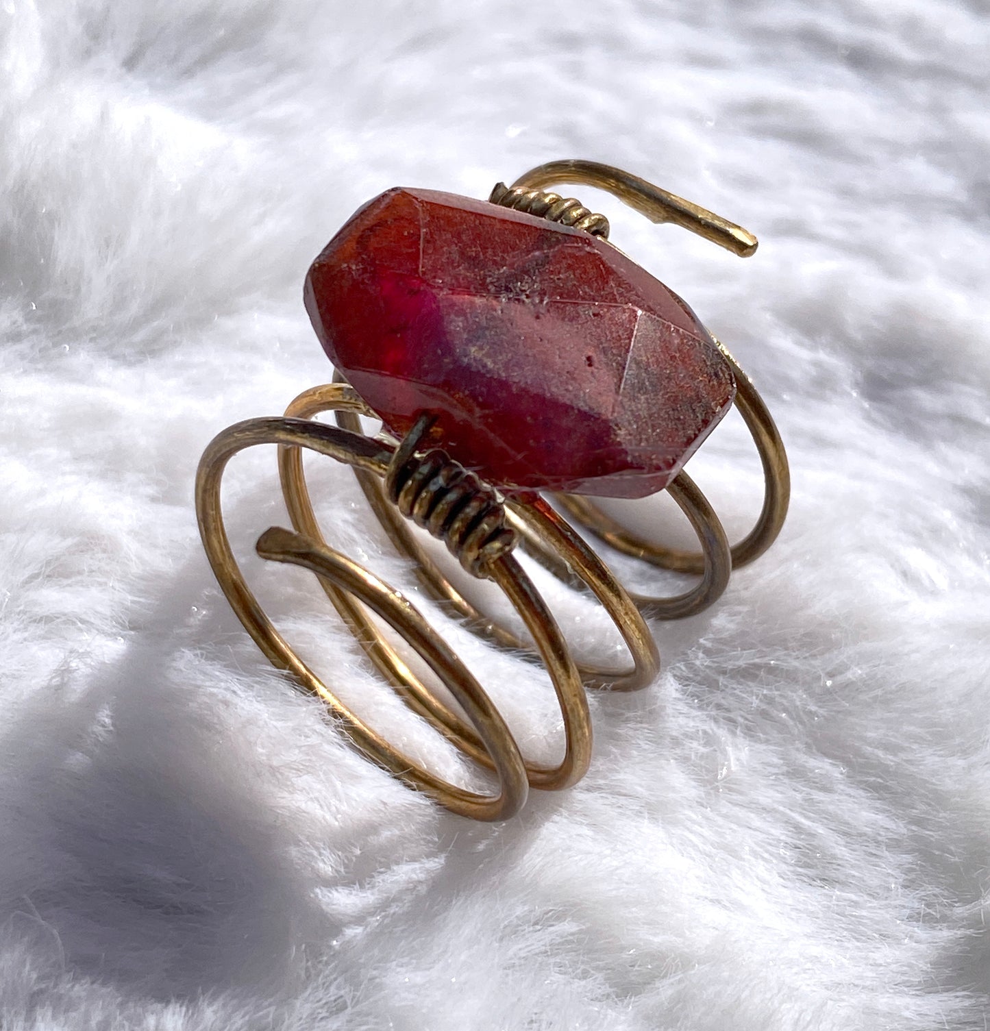 Hand hammered Brass wire ring with garnet birthstone