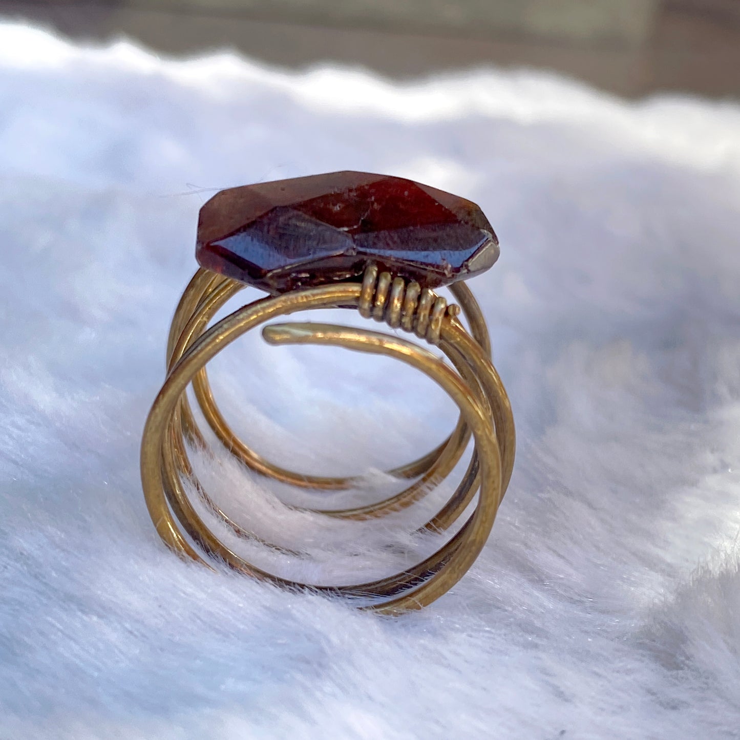 Hand hammered Brass wire ring with garnet birthstone