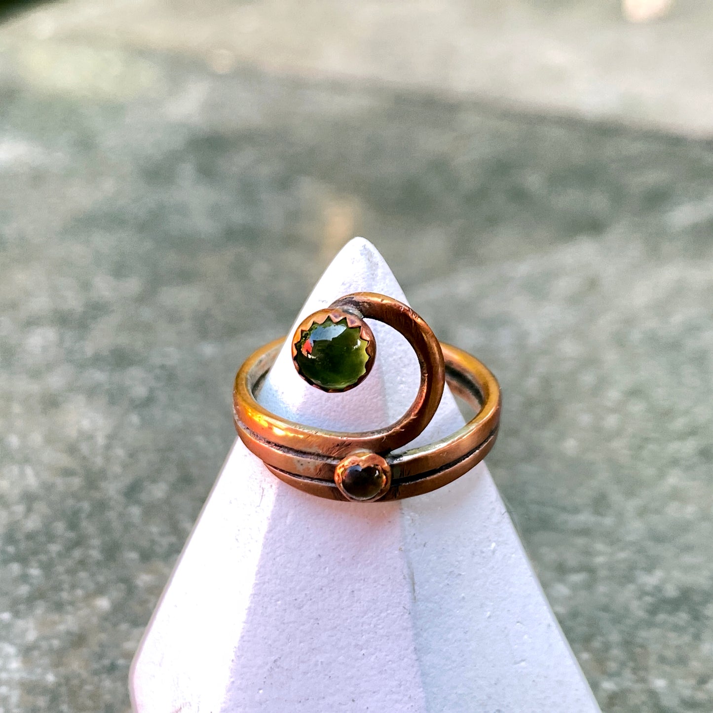 Handmade copper Ring with a Peridot gemstone.