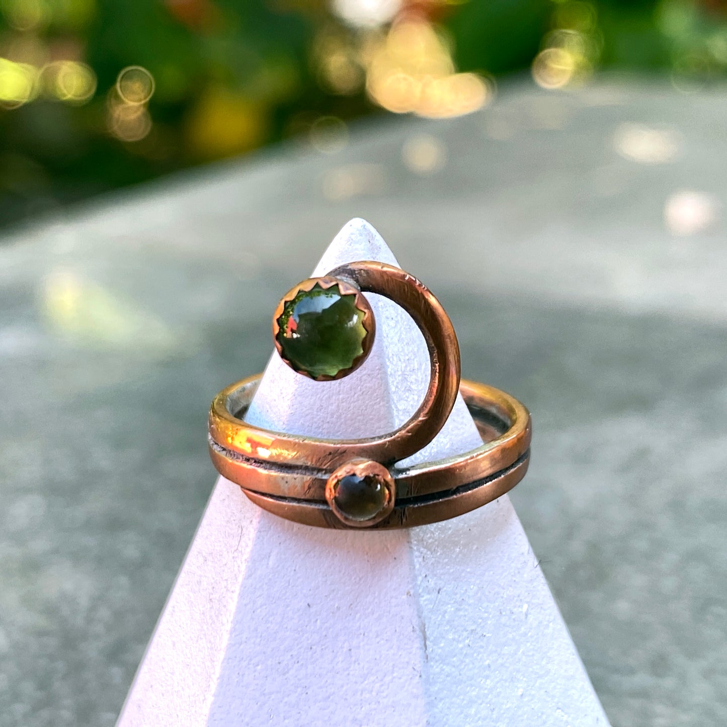 Handmade copper Ring with a Peridot gemstone.