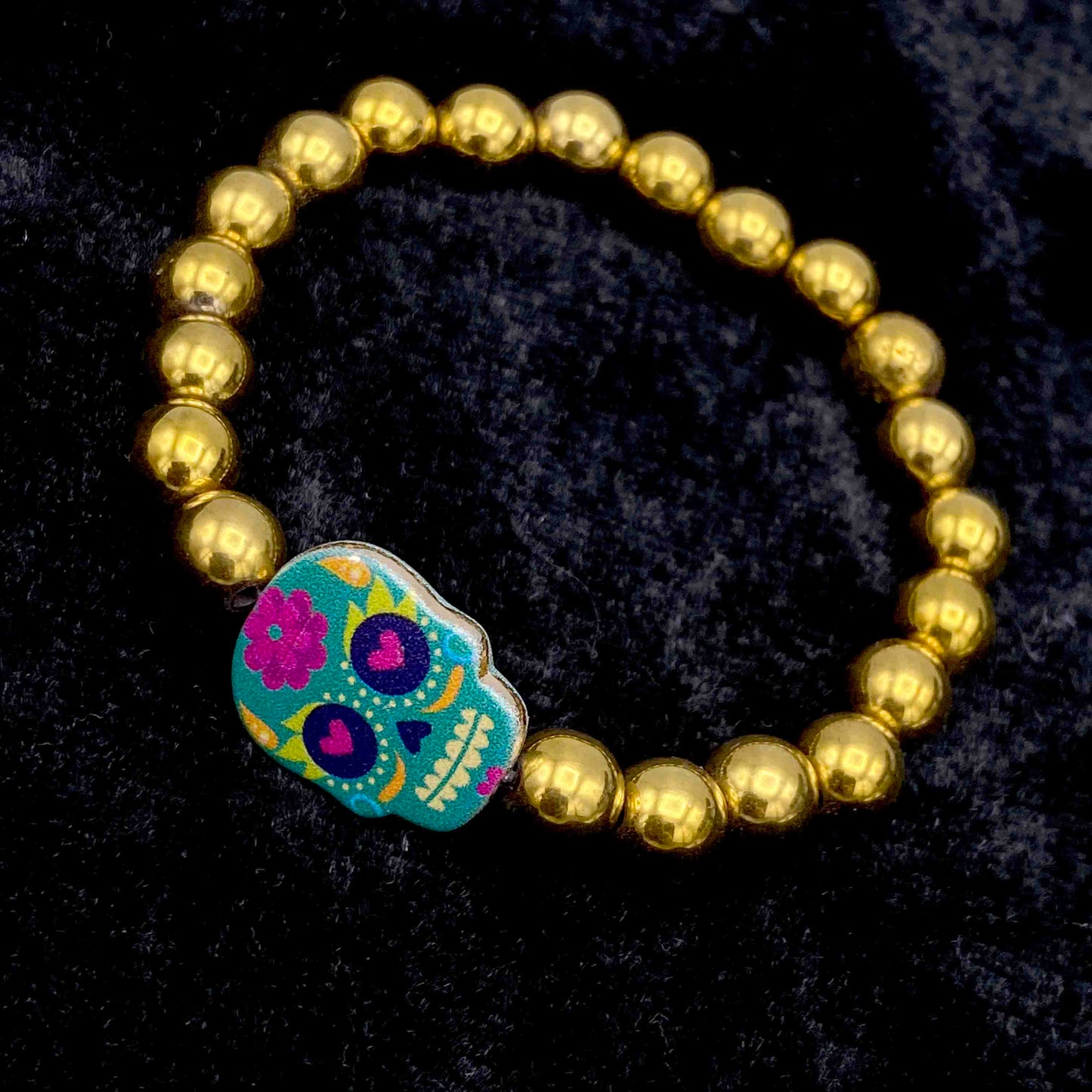 Metal Skull on gemstone beaded bracelet