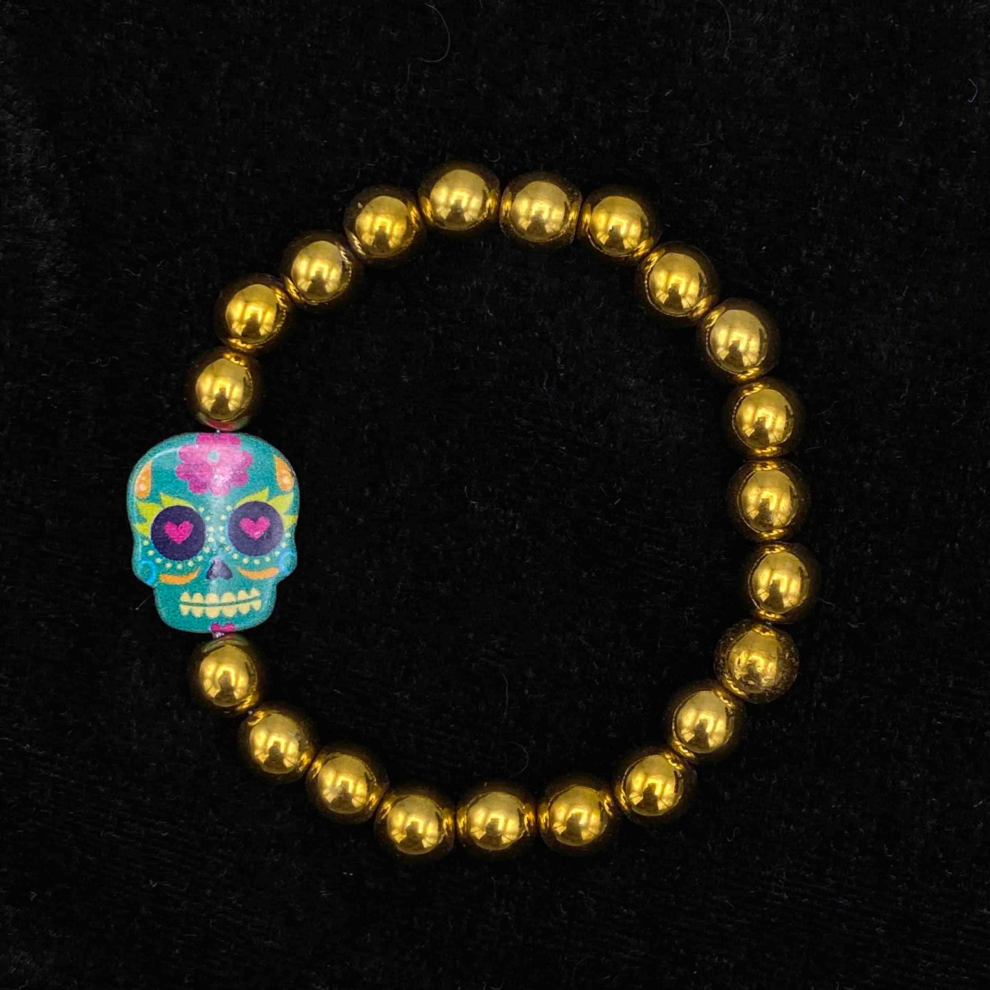 Metal Skull on gemstone beaded bracelet