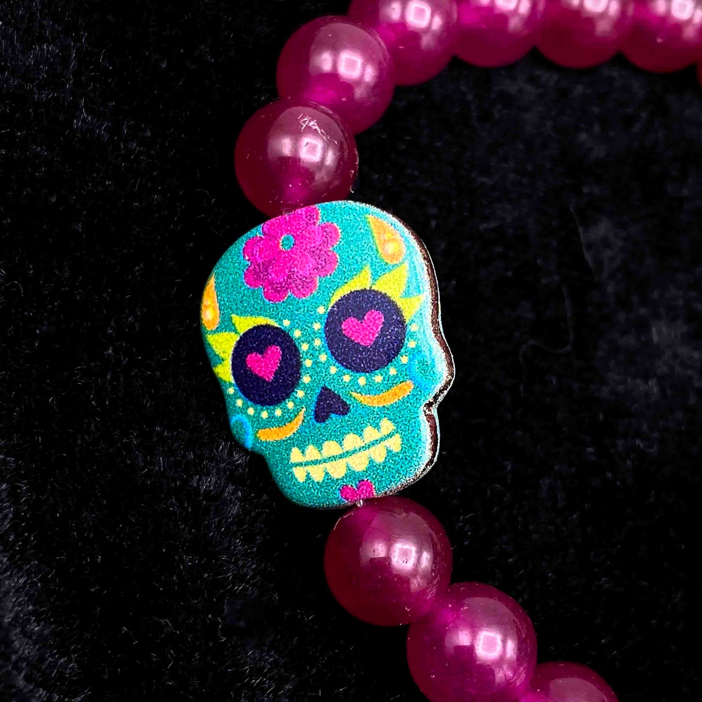 Metal Skull on gemstone beaded bracelet