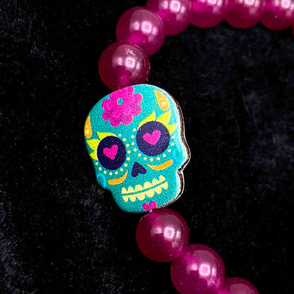 Metal Skull on gemstone beaded bracelet