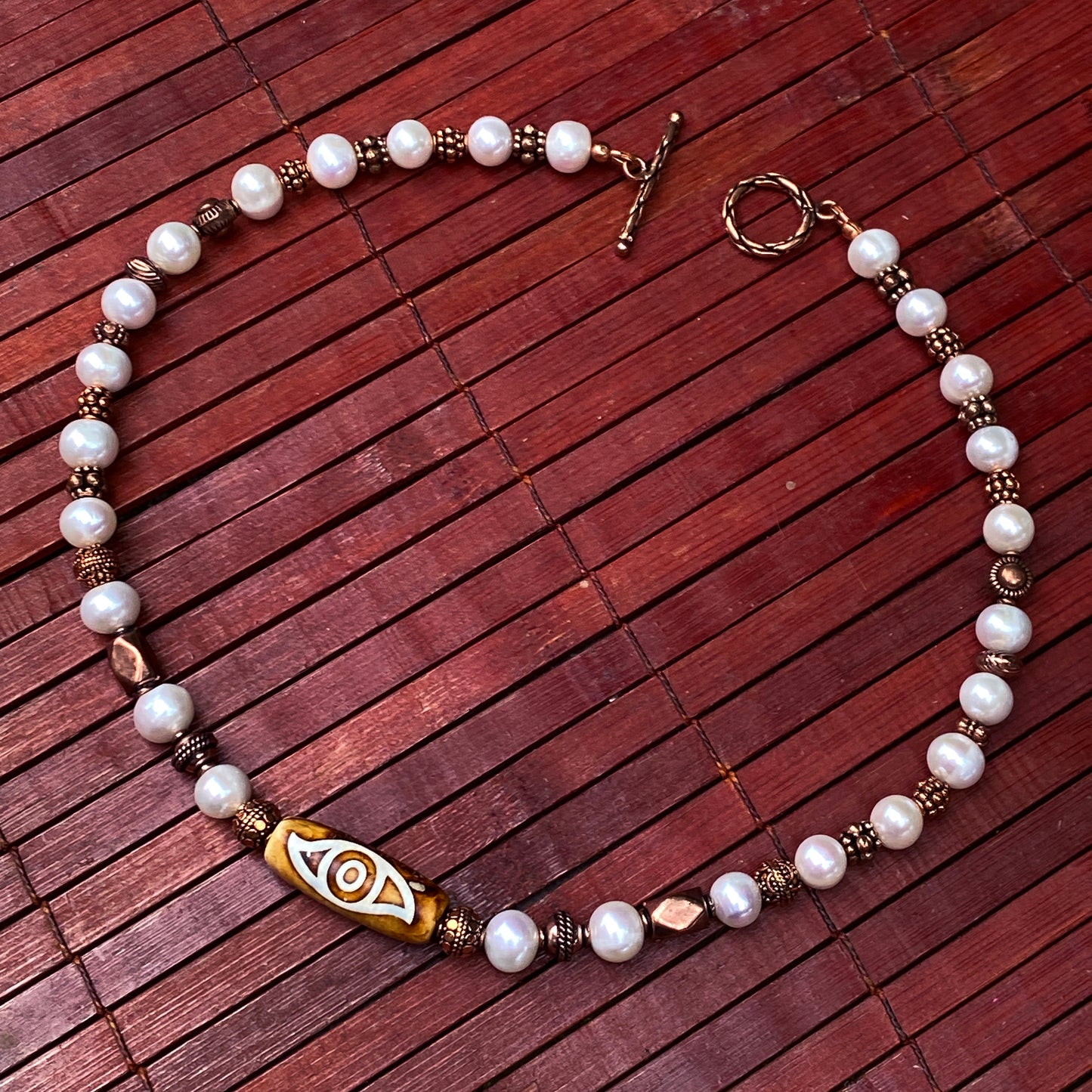 Pearl and Copper Evil Eye Necklace