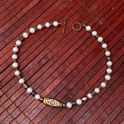 Pearl and Copper Evil Eye Necklace