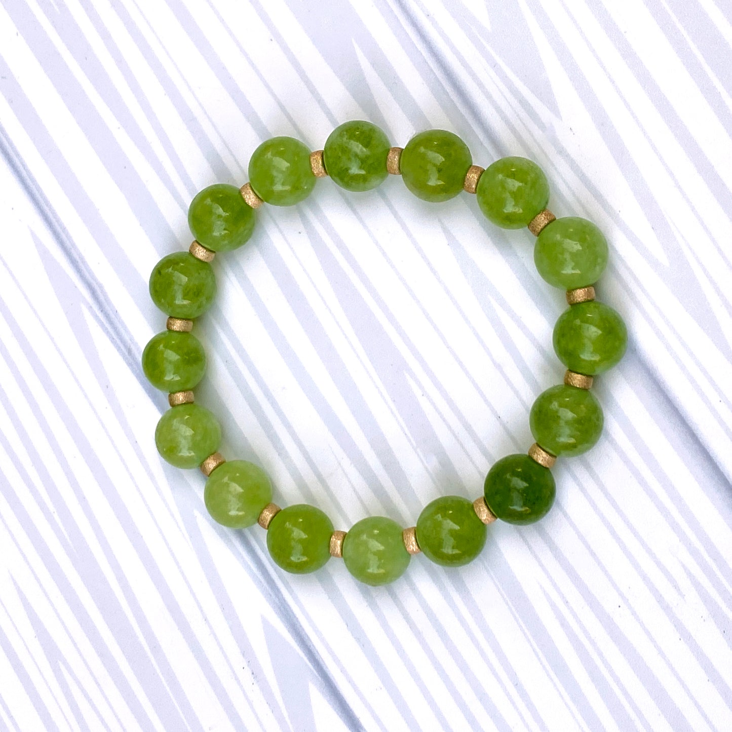 Genuine Peridot gemstone stretch Bracelet with 14kt golf fill