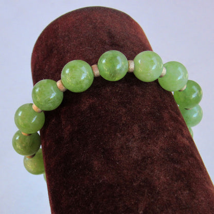 Genuine Peridot gemstone stretch Bracelet with 14kt golf fill