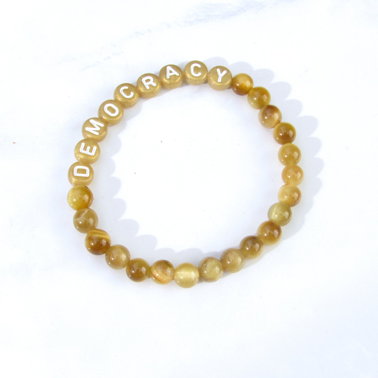 His and Her's Golden Tiger Eye DEMOCRACY phrase Bracelet