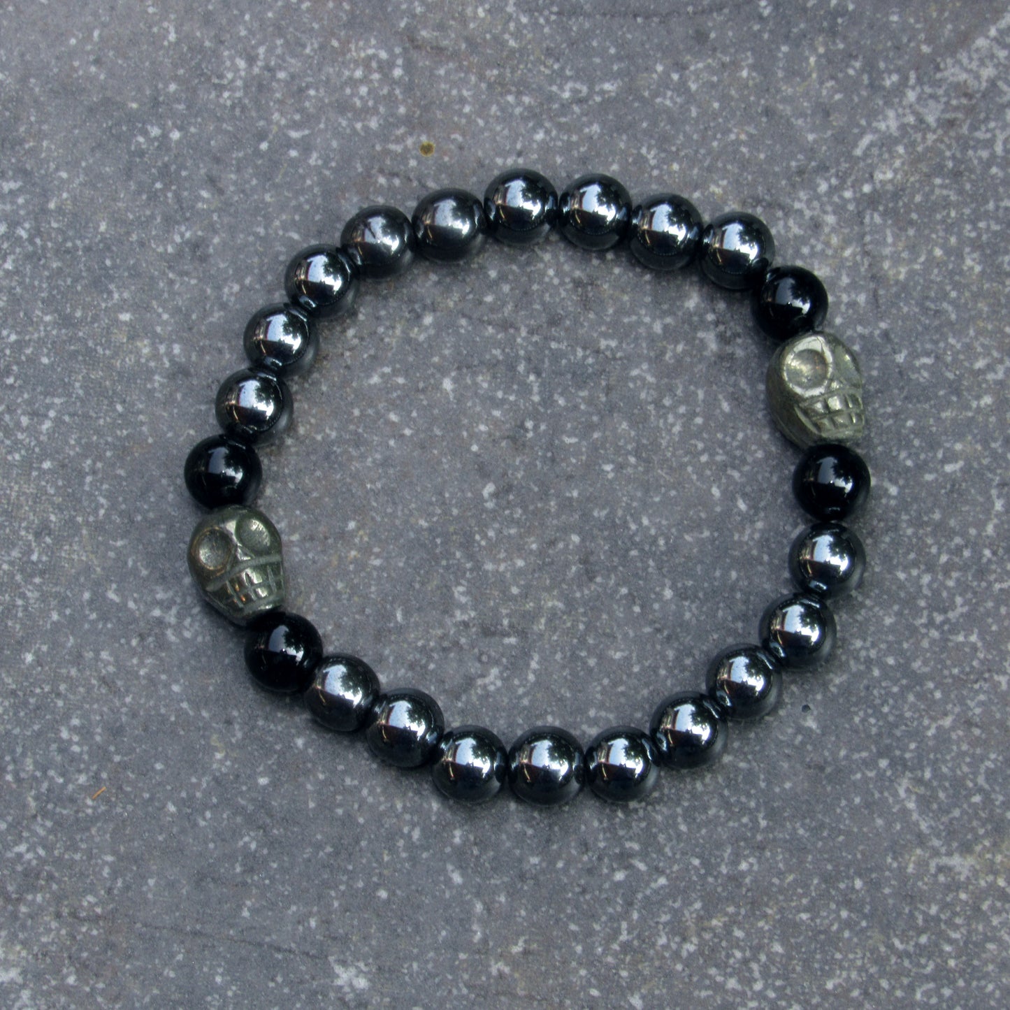 Hematite Gemstone and Skulls bracelet