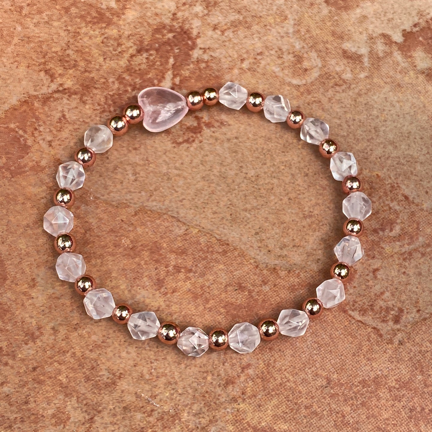 Women's KISS Gemstone bracelet stack set with Opals, Rose Quartz and Clear Quartz heart.