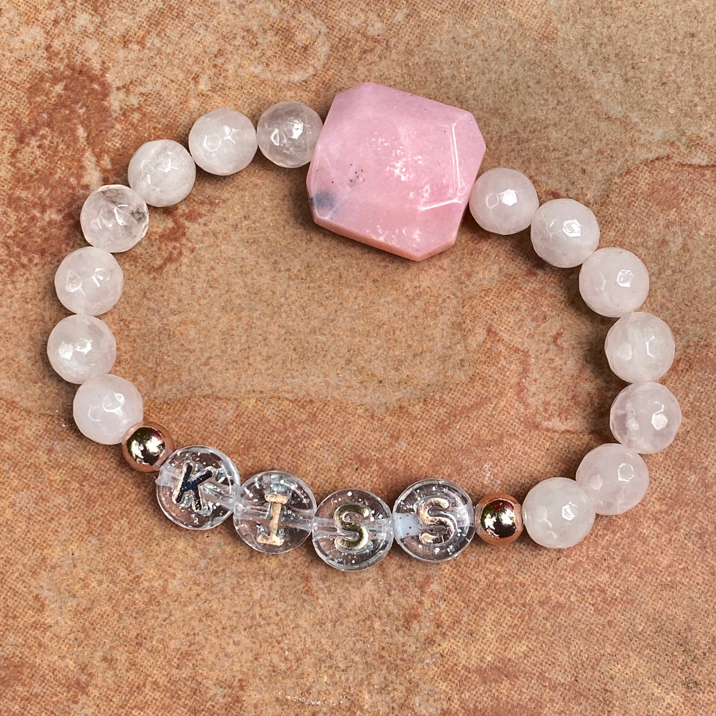 Women's KISS Gemstone bracelet stack set with Opals, Rose Quartz and Clear Quartz heart.
