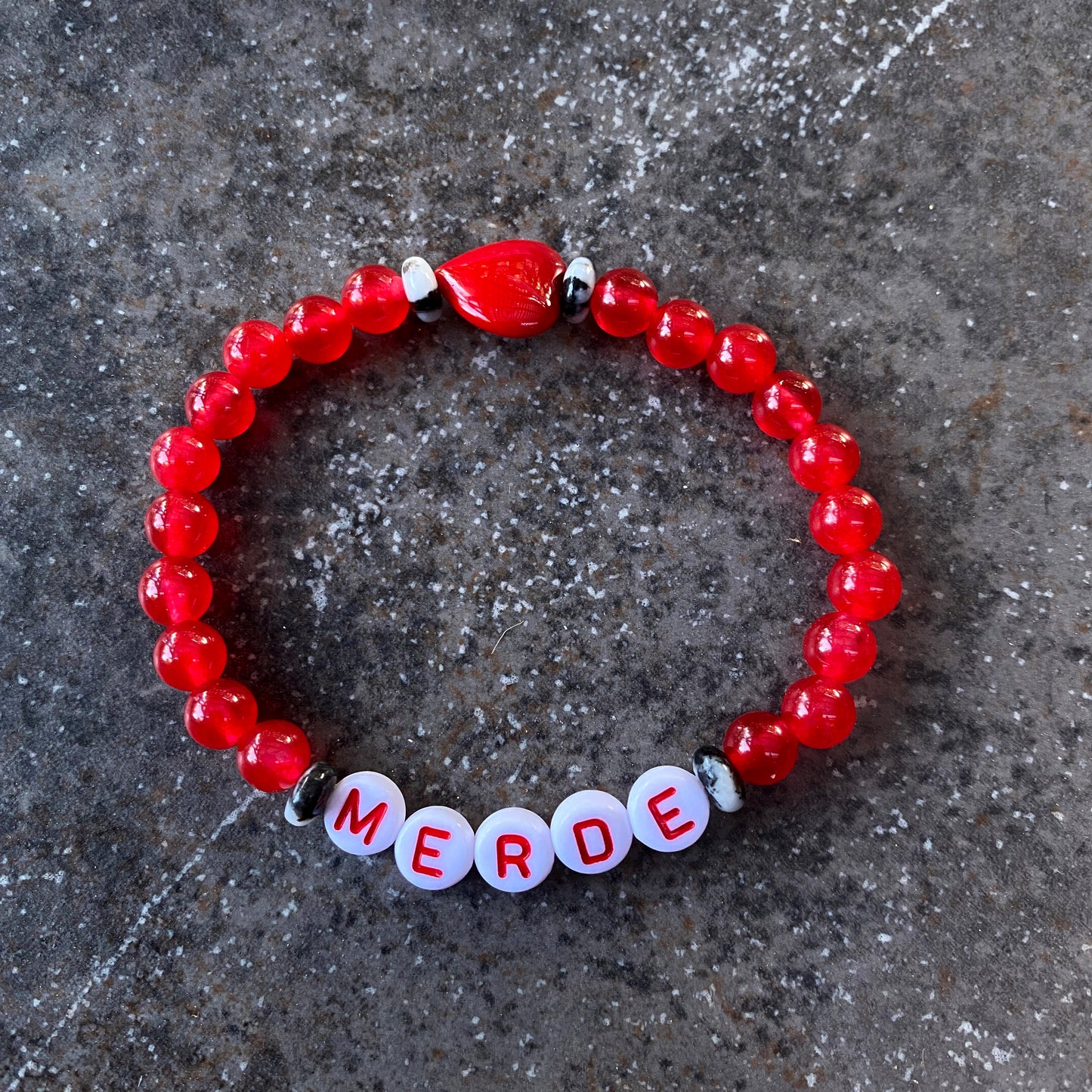 Women’s “merde” curse bracelet pink agate, rose hematite, and mother of pearl