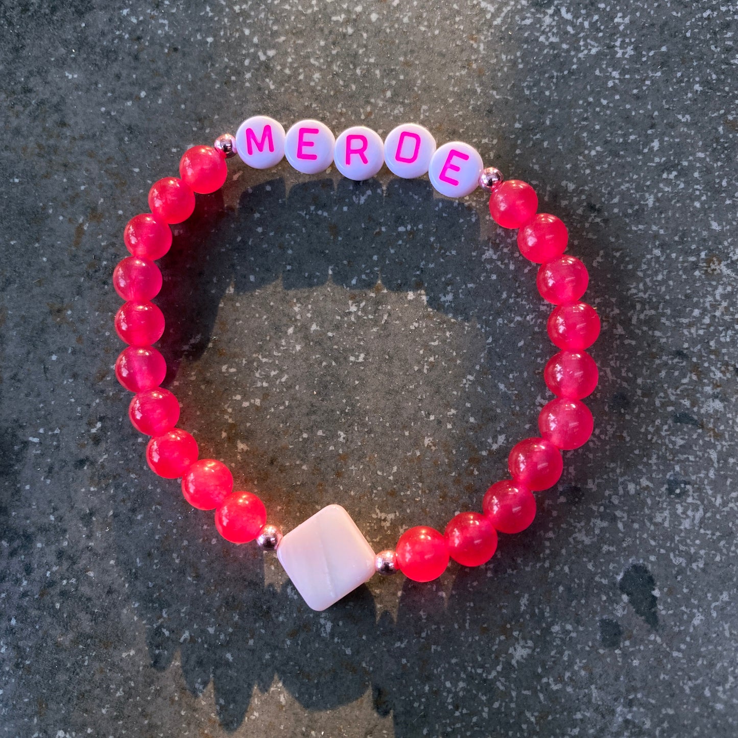 Women’s “merde” curse bracelet pink agate, rose hematite, and mother of pearl