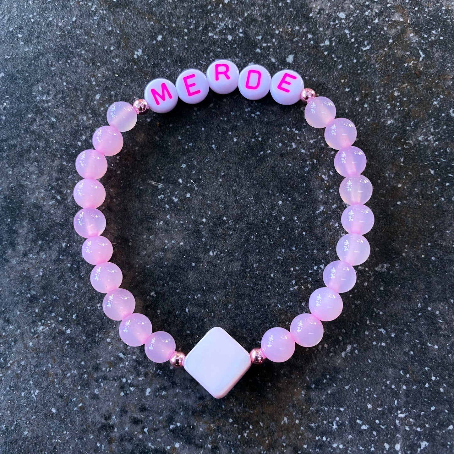 Women’s “merde” curse bracelet pink agate, rose hematite, and mother of pearl