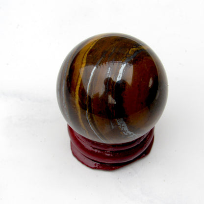 Natural Tiger Eye crystal gemstone semiprecious sphere with stand