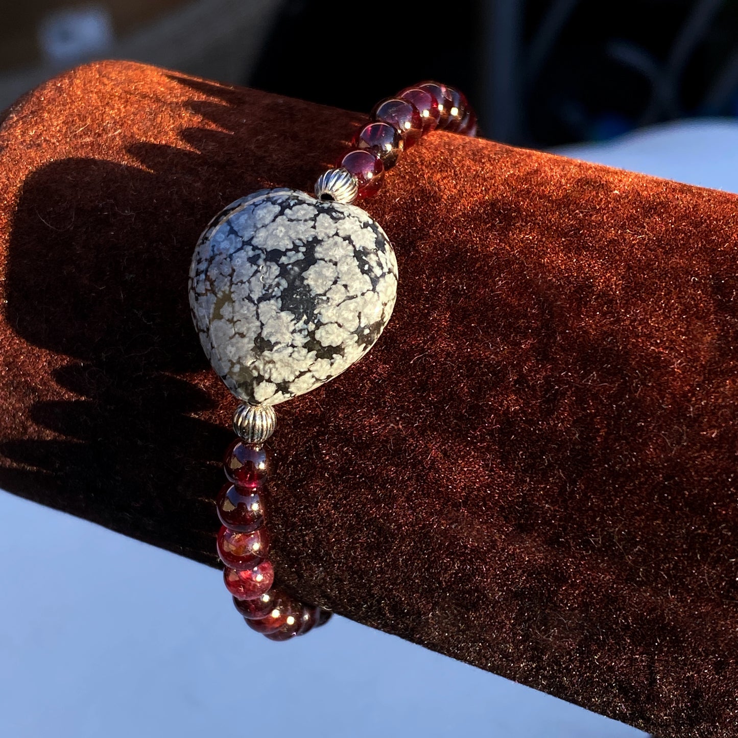 Garnet gemstones, Snowflake Obsidian Heart, and Sterling Silver Stretch Bracelet