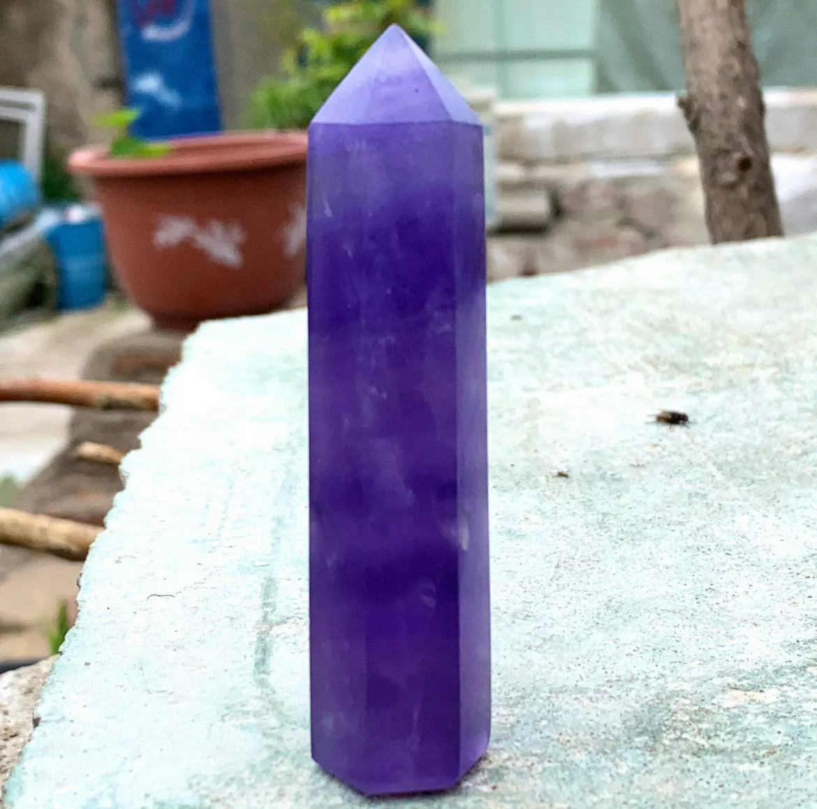 Natural purple fluorite gemstone tower point aura wand