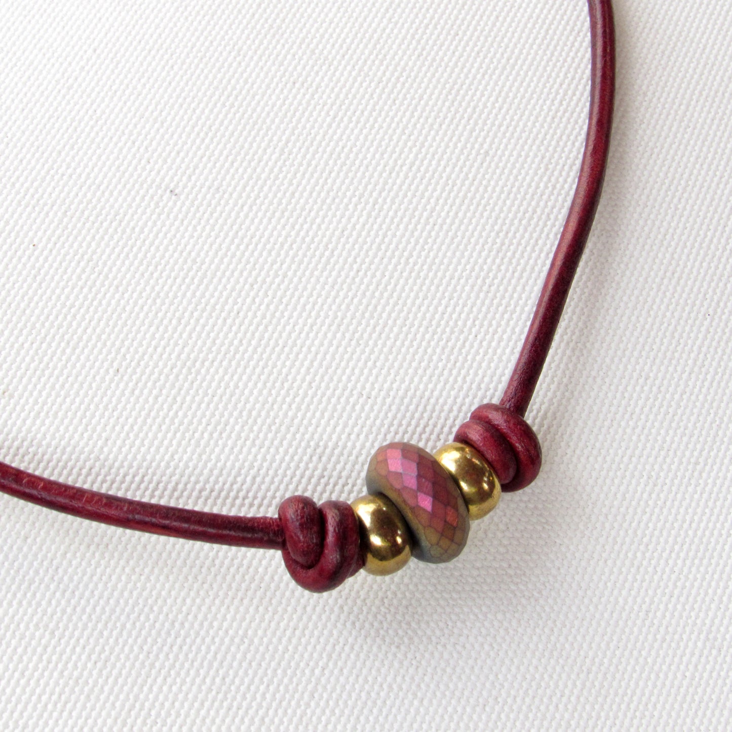 Hematite gemstone with Brass on Red Leather Necklace