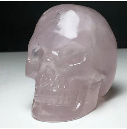 Natural Rose Quartz gemstone Carved Skull Figurine