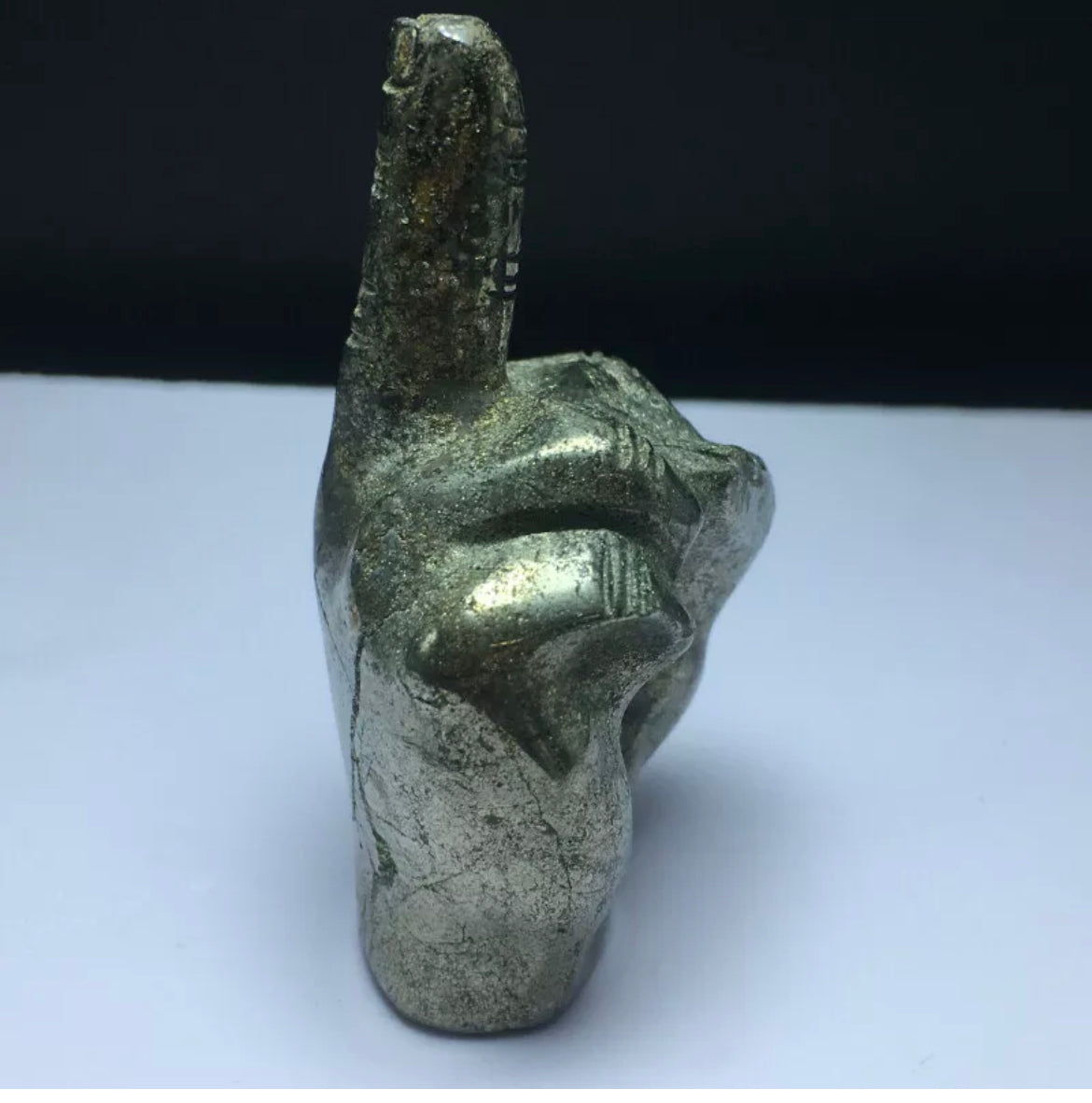 Natural pyrite middle finger figurine