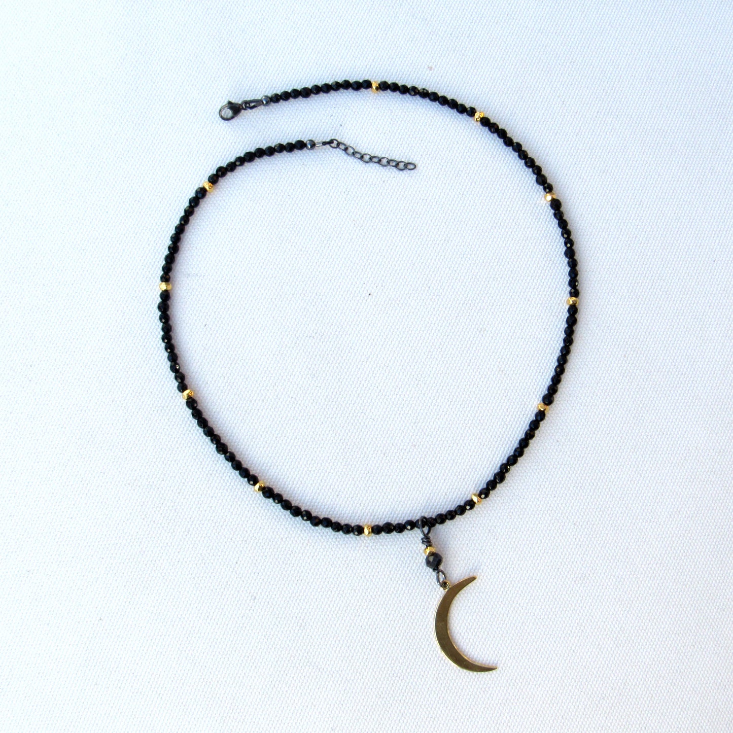 Black onyx, gold vermeil over sterling silver Moon and beads. Black non conflict diamond