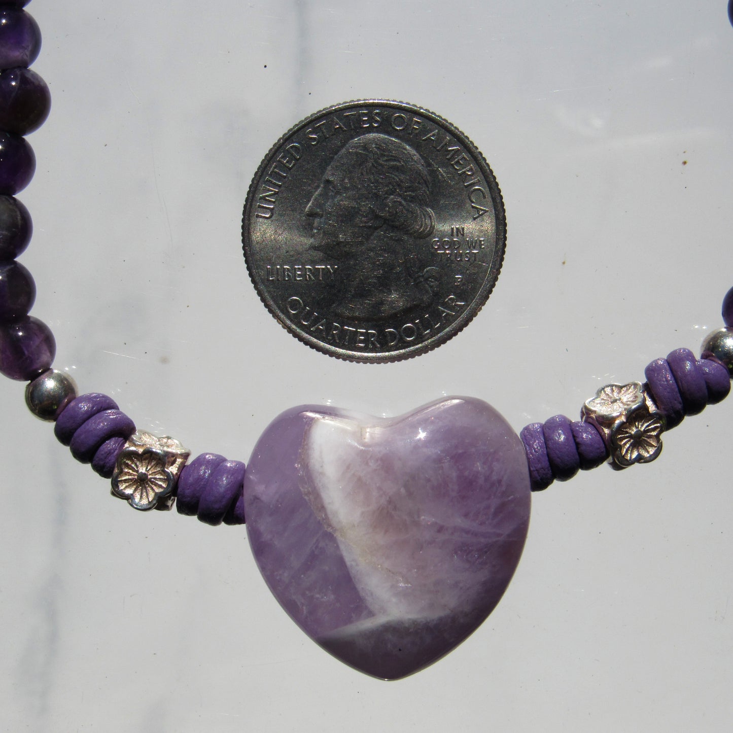 Amethyst gemstone and heart with sterling silver on leather necklace