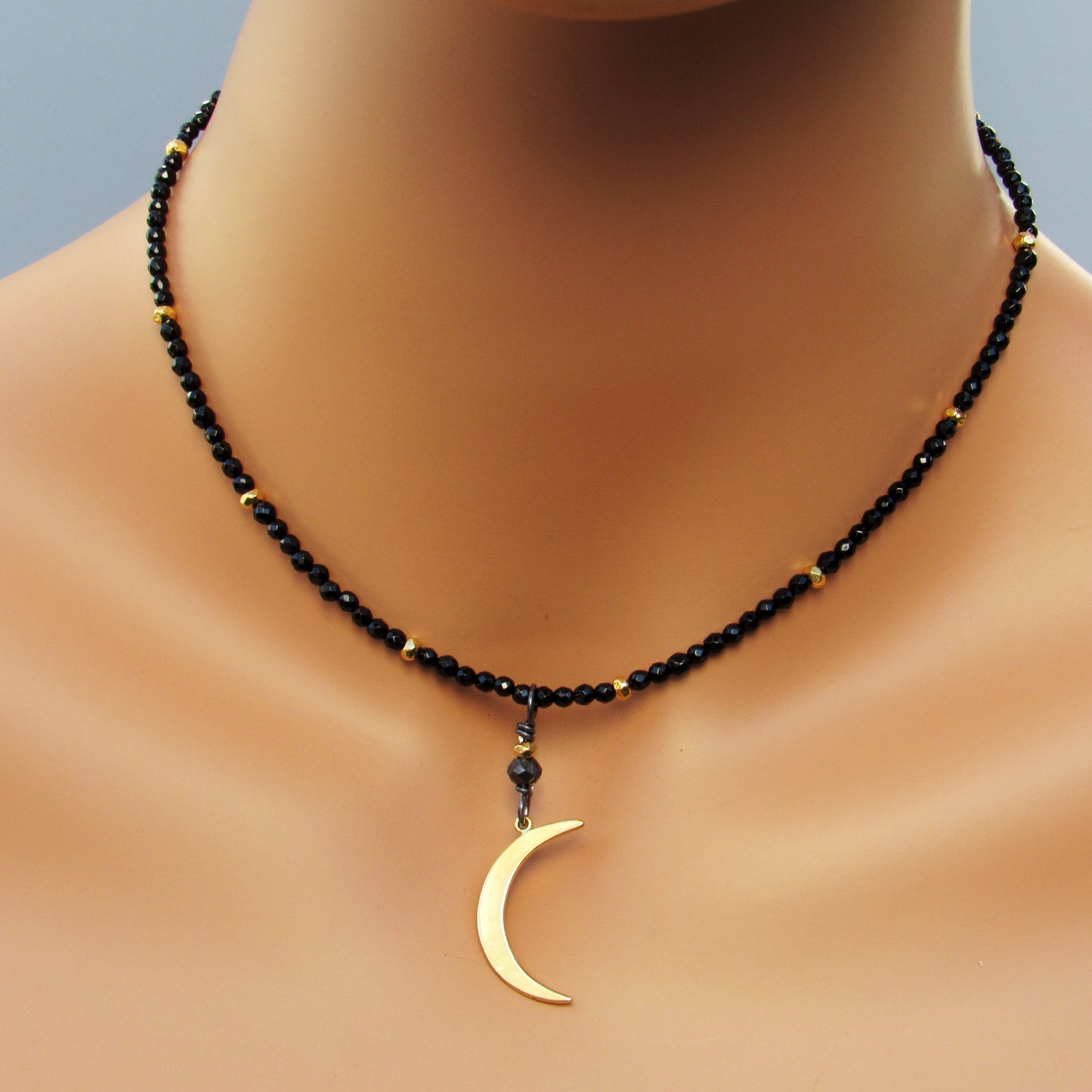 Black onyx, gold vermeil over sterling silver Moon and beads. Black non conflict diamond