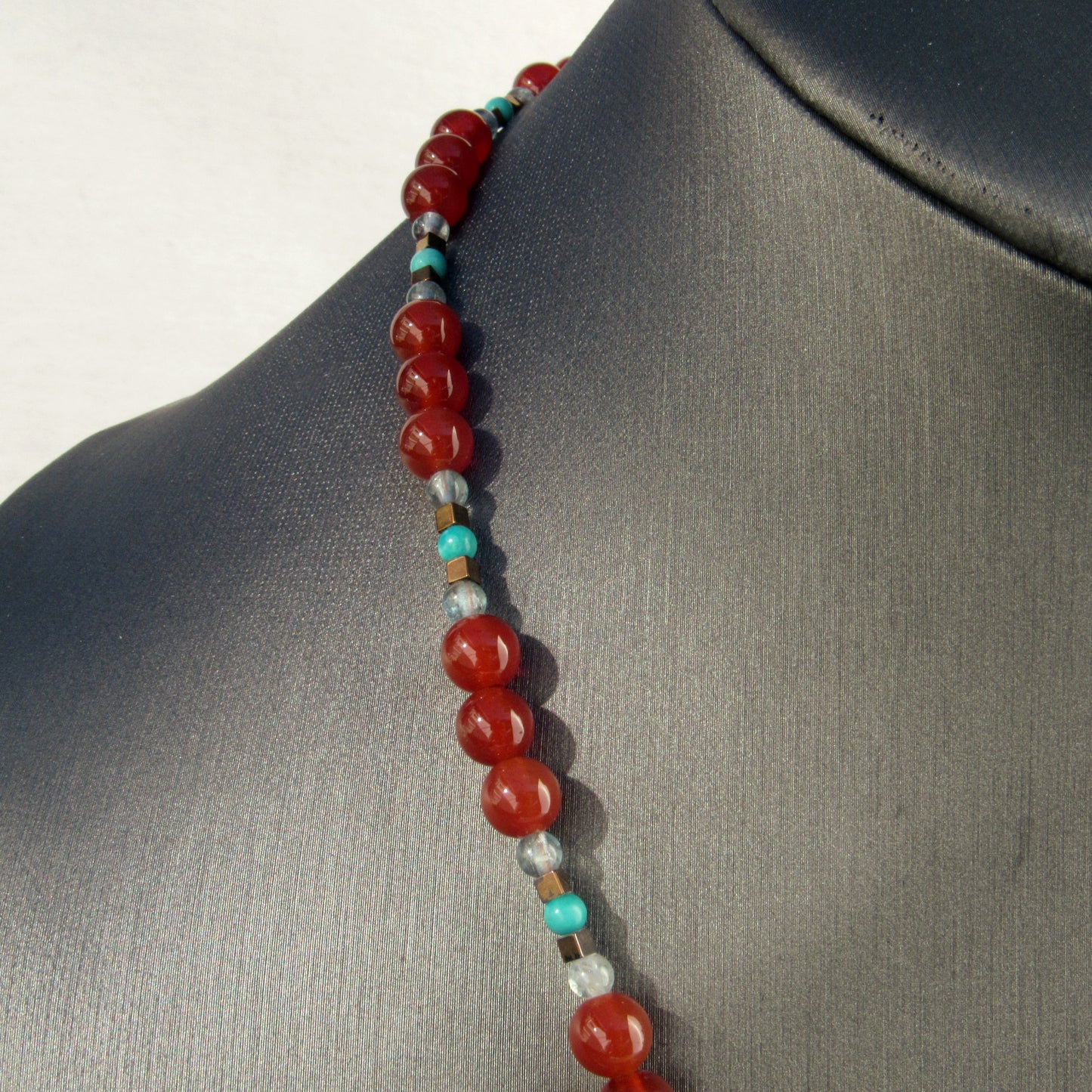 Bornite Gemstone pendant on carnelian, apatite, and hematite Beaded Necklace